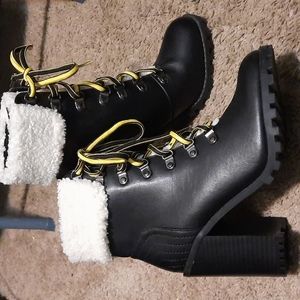 4 inch heel black ankle boot. Size 7 US.